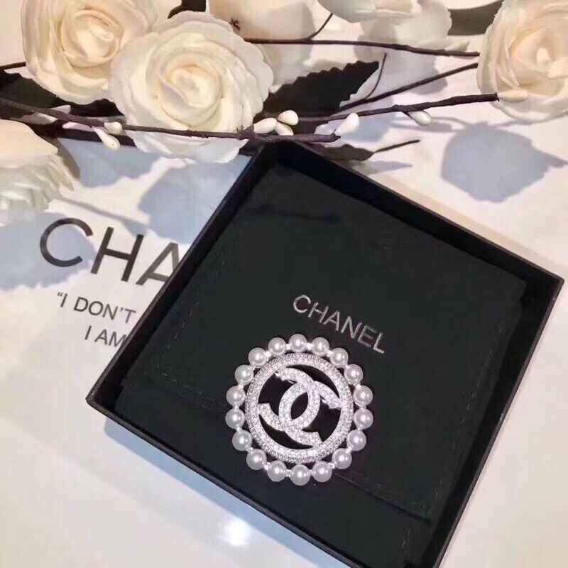 Ch*el brooches